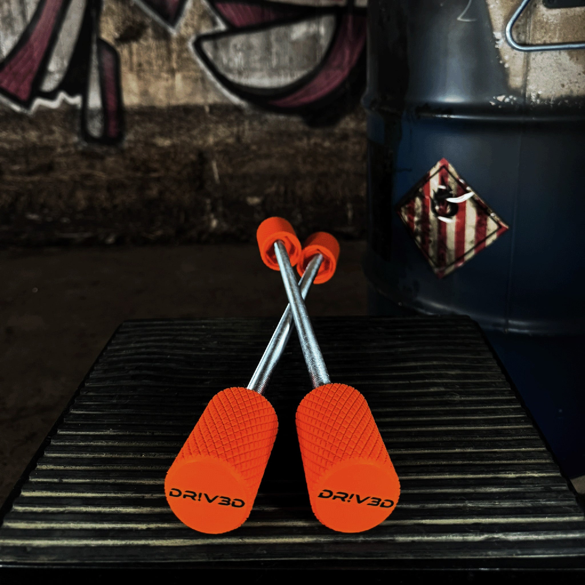 DRIV3D Stuntpegs – ORANGE – Kompakte Axle Sliders (60 mm)